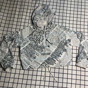 Newspaper print crop hoodie